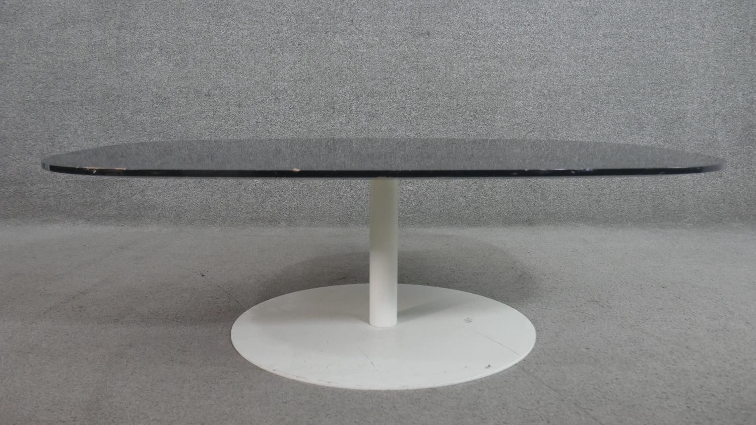 Piero Lissoni for Fritz Hansen, a Tulip style coffee table, Denmark 2006, with a curved smoked glass