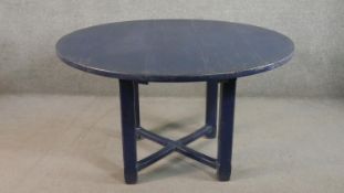 A contemporary Chalon circular breakfast table, circa 2005, blue painted and distressed, with a