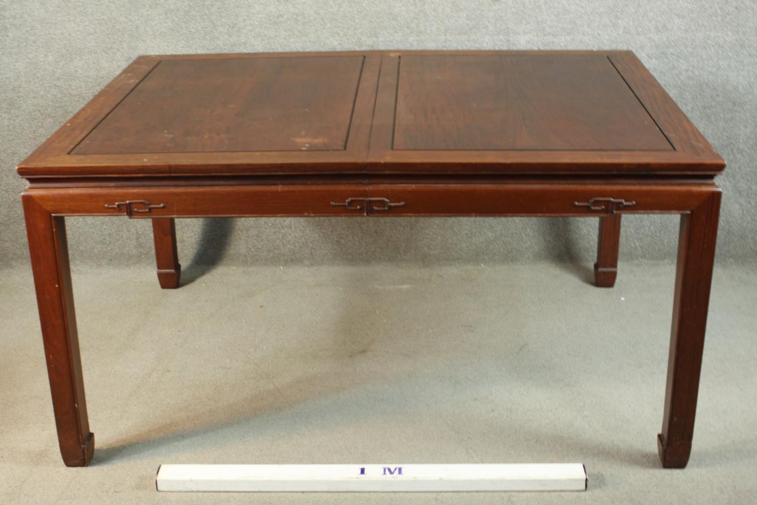 A late 20th century Chinese rosewood dining table, with a rectangular top and two additional leaves, - Image 2 of 14