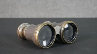 A pair of late 19th century brass racing binoculars, Le Jockey Club, Paris. H.5 W.12cm