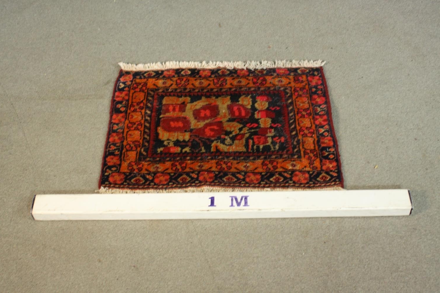 A hand made red ground Persian Sirjan rug. L.68 W.50cm. - Image 2 of 3