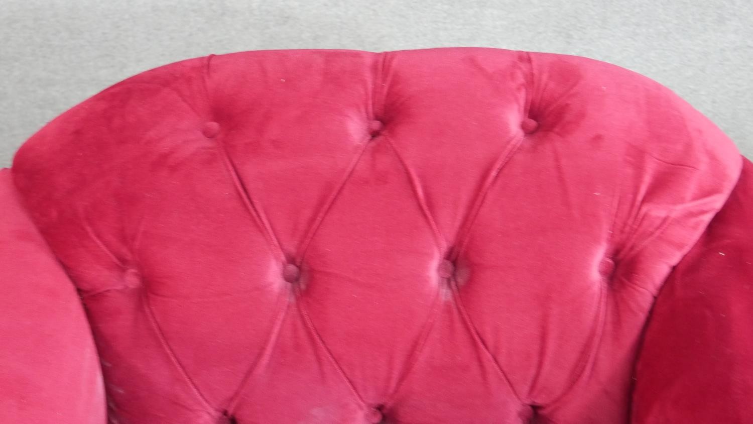 A contemporary Harto armchair, upholstered in crimson suede style fabric, with a buttoned back, - Image 4 of 6