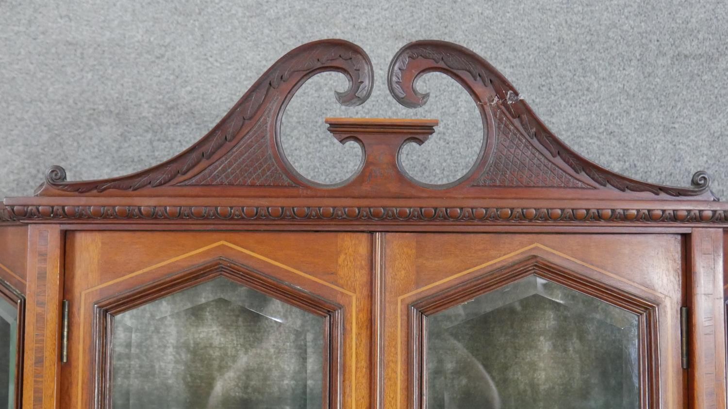 An Edwardian mahogany display cabinet, with a swan neck pediment, over a pair of bevelled glass - Image 2 of 8