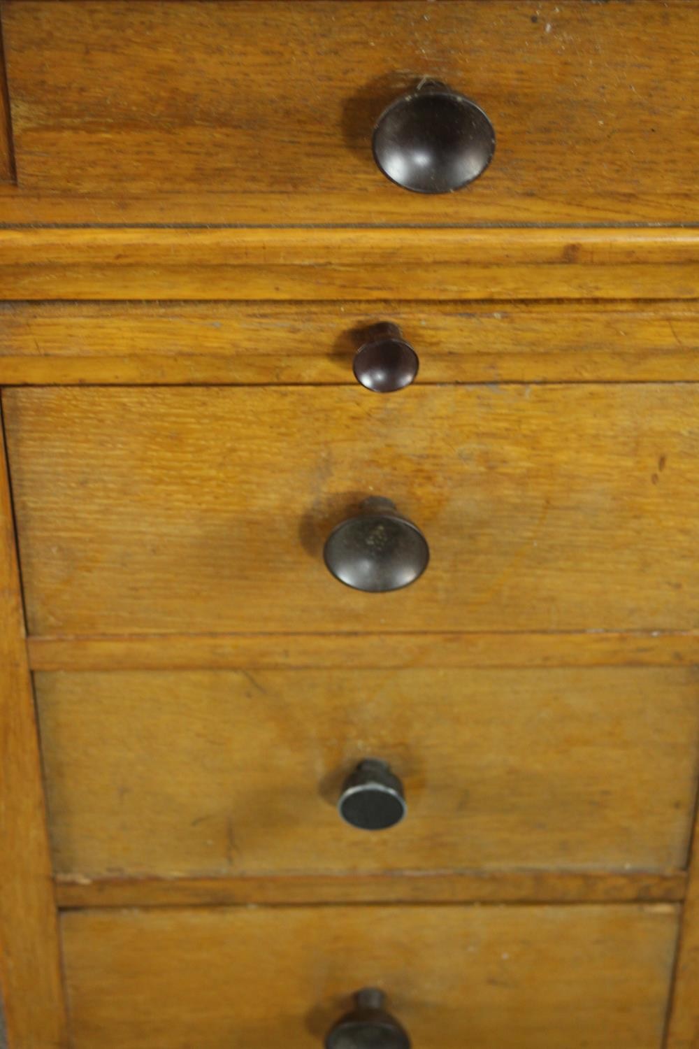 An early to mid 20th century oak pedestal desk, with three short drawers, over two slides, above two - Image 9 of 9