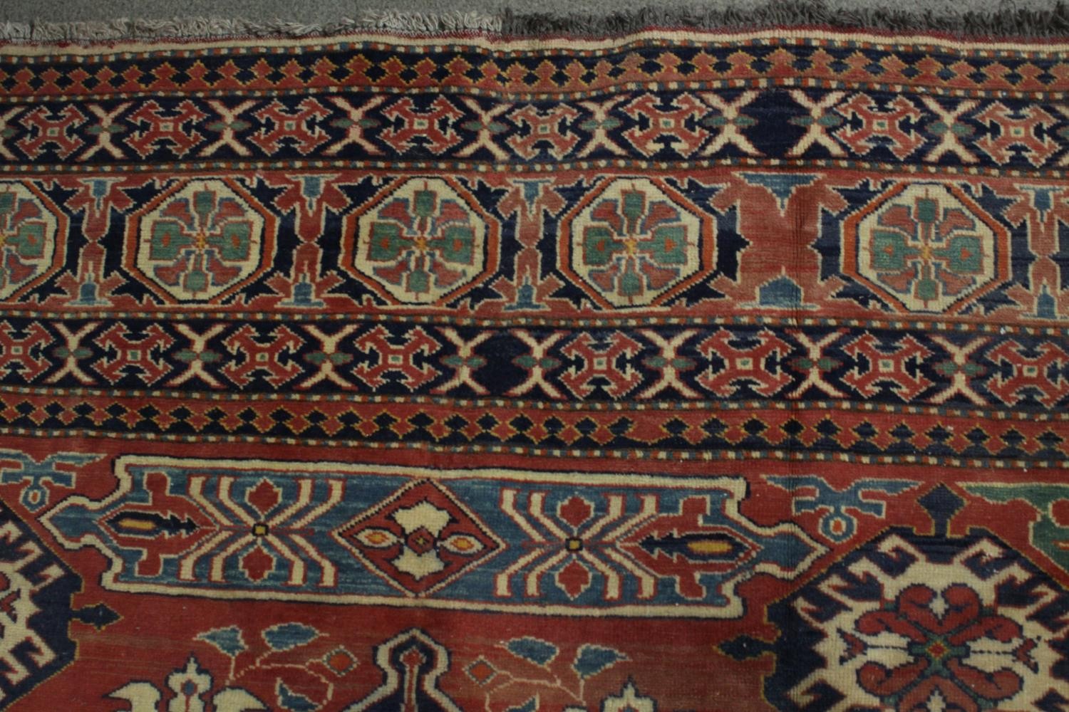 A hand made blue ground Chechen carpet. L.266 W.220cm. - Image 4 of 6