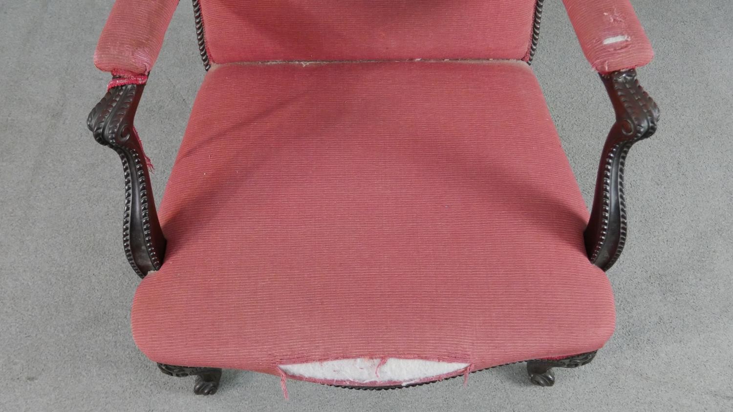 A 19th century mahogany open armchair, upholstered in crimson coloured fabric, the scrolling arms - Image 3 of 7