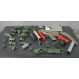 A collection of Hornby trains, track and control centre along with Dinky die cast army vehicles.