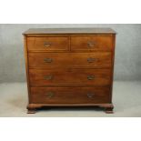 A Victorian walnut and line inlaid chest of two short over three long drawers, on ogee feet. H.115