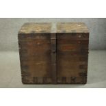 A 19th century iron banded oak silver chest, of rectangular form, with two pairs of iron handles