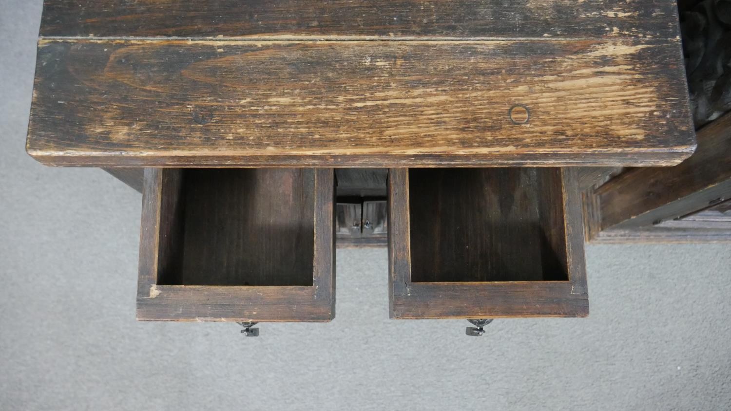 A pair of rustic stained pitch pine side cabinets, with a plank top over two short drawers and two - Image 3 of 7