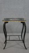 A Victorian style black painted occasional table, the cartouche shaped top painted with flowers,