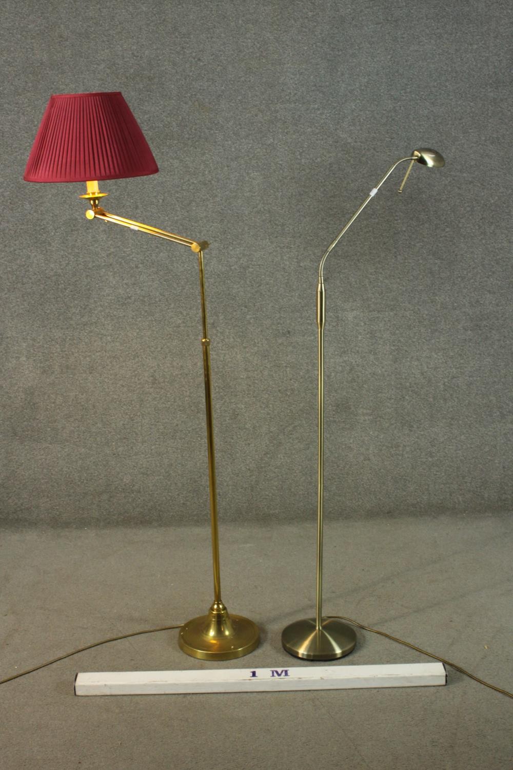 Two adjustable brass floor lamps, one with an extending arm and circular base and the other - Image 2 of 12