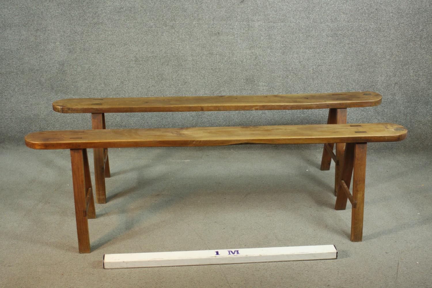 A pair of 19th century French provincial oak benches, the plank tops with rounded ends, on splayed - Image 2 of 8