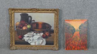 A framed oil on canvas of a still life, indistinctly inscribed verso along with an oil on board