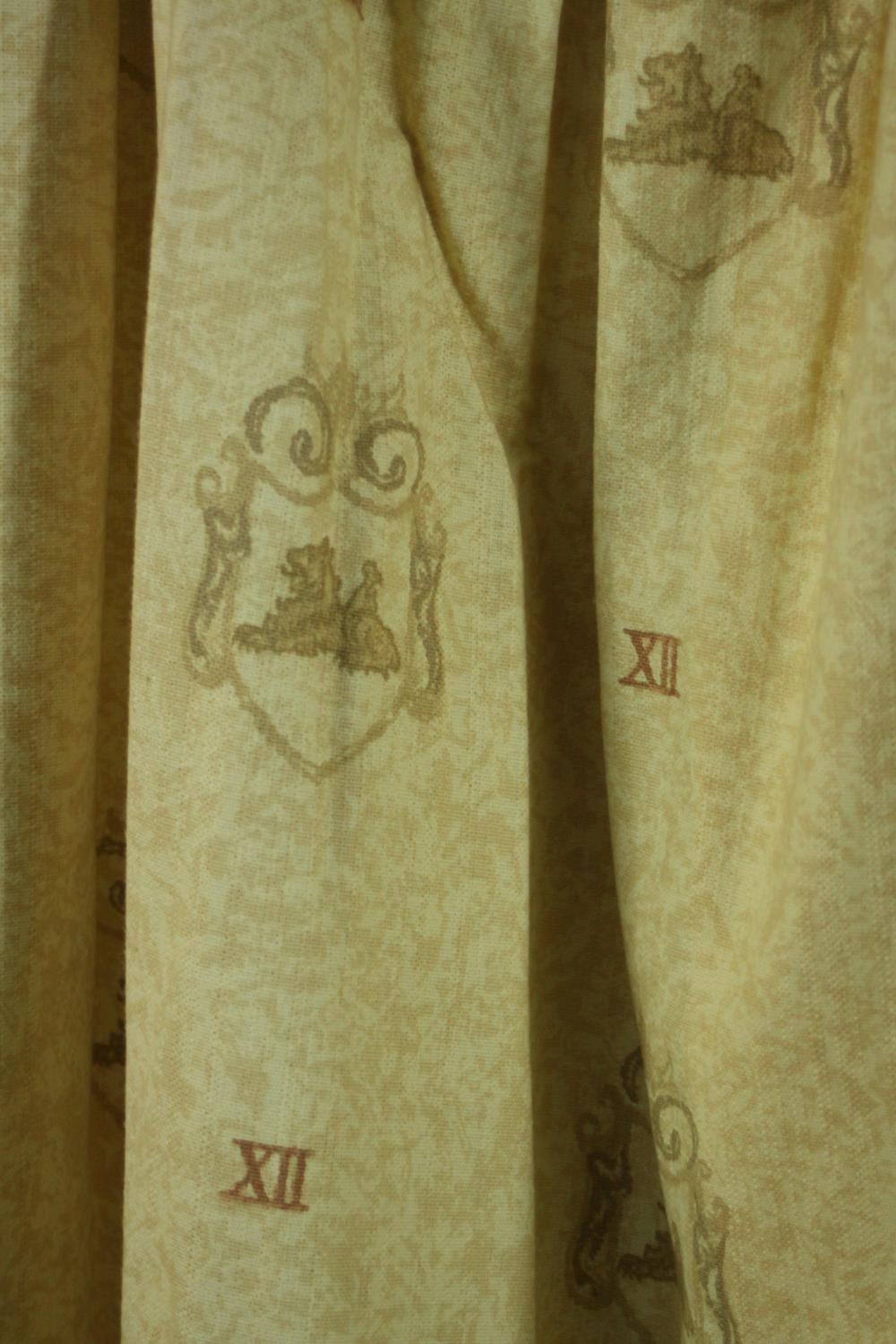 Three fully lined yellow cotton mix curtains decorated with heraldic design. H.170 W.220cm. - Image 3 of 9
