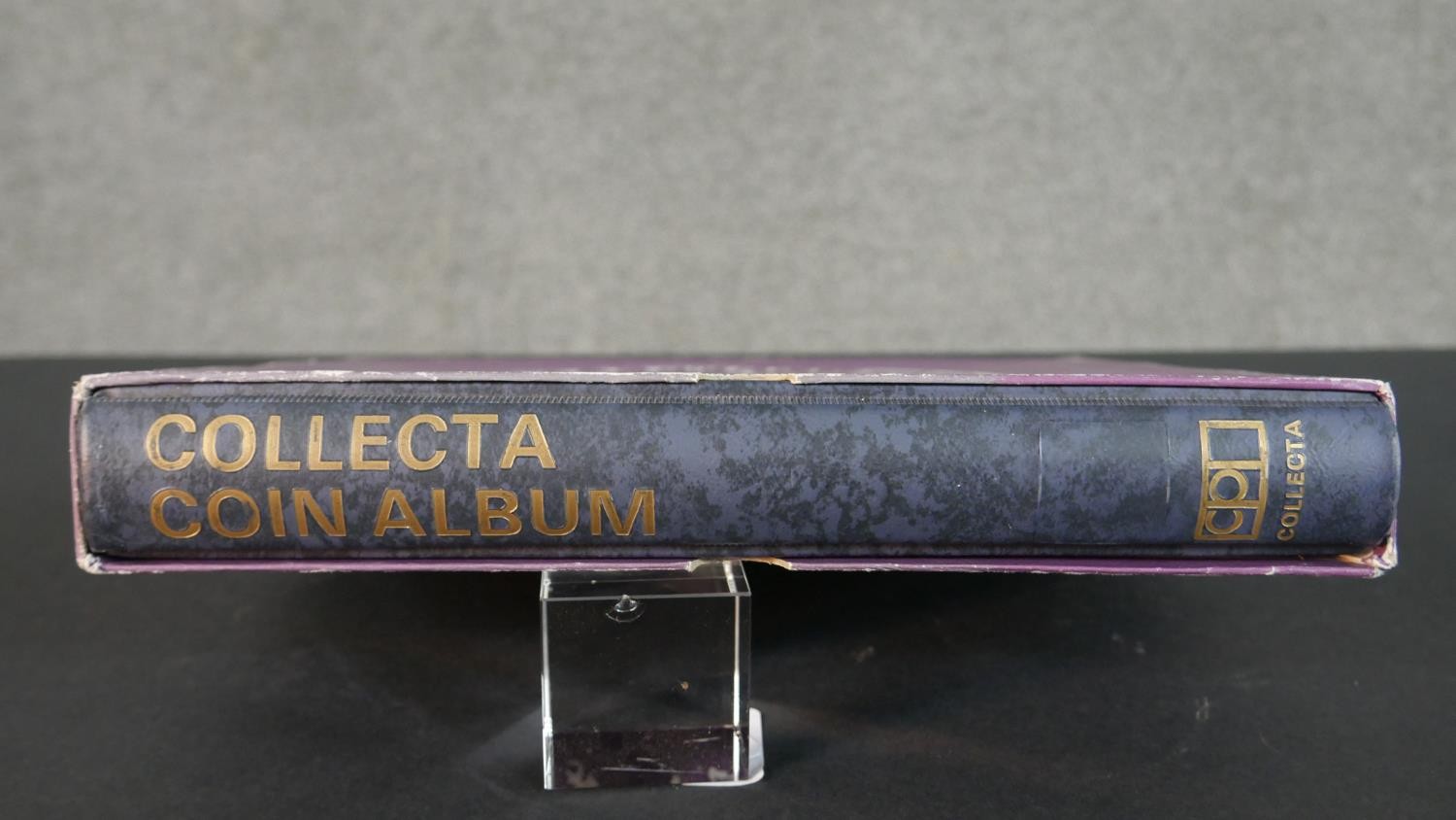 An album of world stamps along with a British Collecta coin album filled with various British coins. - Image 15 of 15