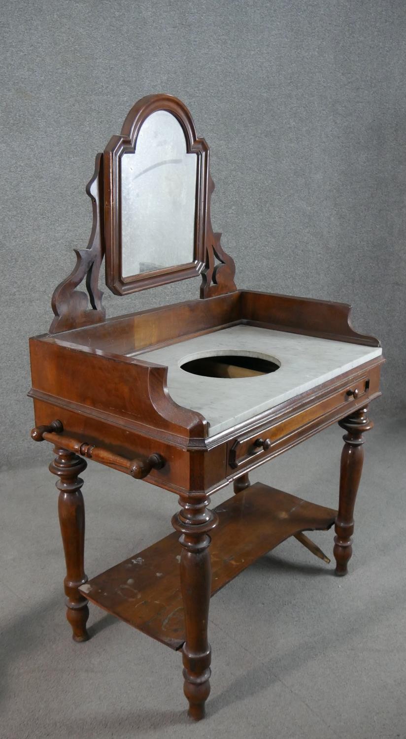 A 19th century mahogany washstand, fitted with swing mirror over a white marble top, above a - Image 7 of 12