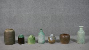 A collection of seven pieces of mid century glazed art pottery. H.29cm (largest)