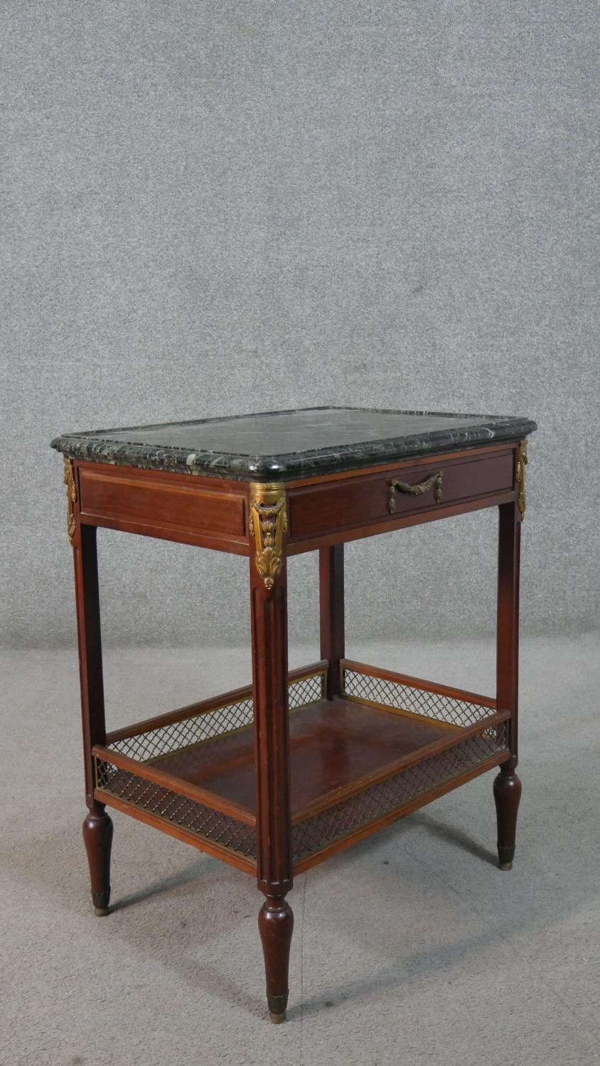 A French Directiore style mahogany gueridon table, with a green marble top, over a single drawer, on - Image 8 of 8