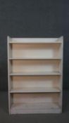 A vintage Herbert E Gibbs open bookcase, later painted. H.111 W.66 D.76cm