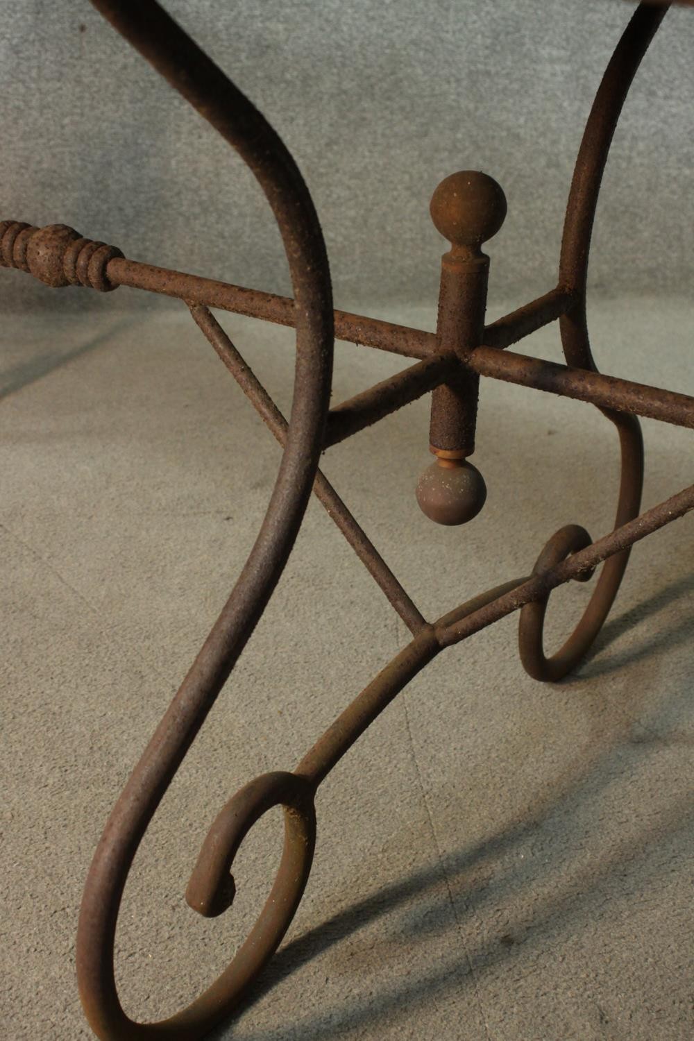 A French wrought iron table, possibly a baker's table, with a rectangular metal top, on scrolling - Image 8 of 8