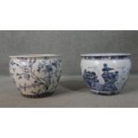 Two Oriental style blue and white ceramic planters/gold fish bowls, one with a Chinese landscape