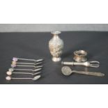 A collection of silver and silver plate, including a silver ice grabber, a silver napkin ring,