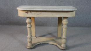 A 19th century painted marble topped washstand on turned supports. H.66 W.90 D.43cm