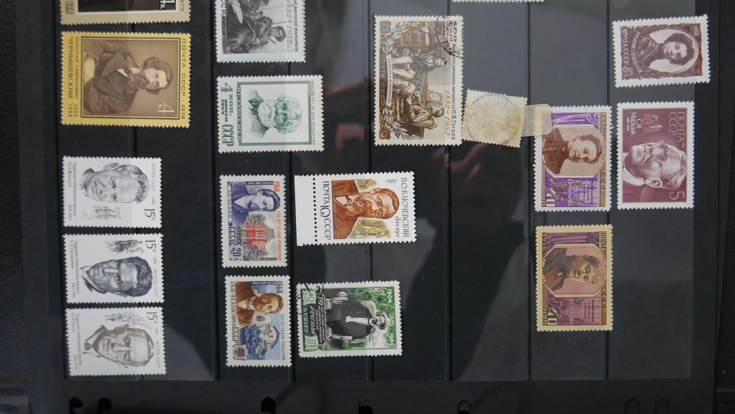 An album of world stamps along with a British Collecta coin album filled with various British coins. - Image 3 of 15