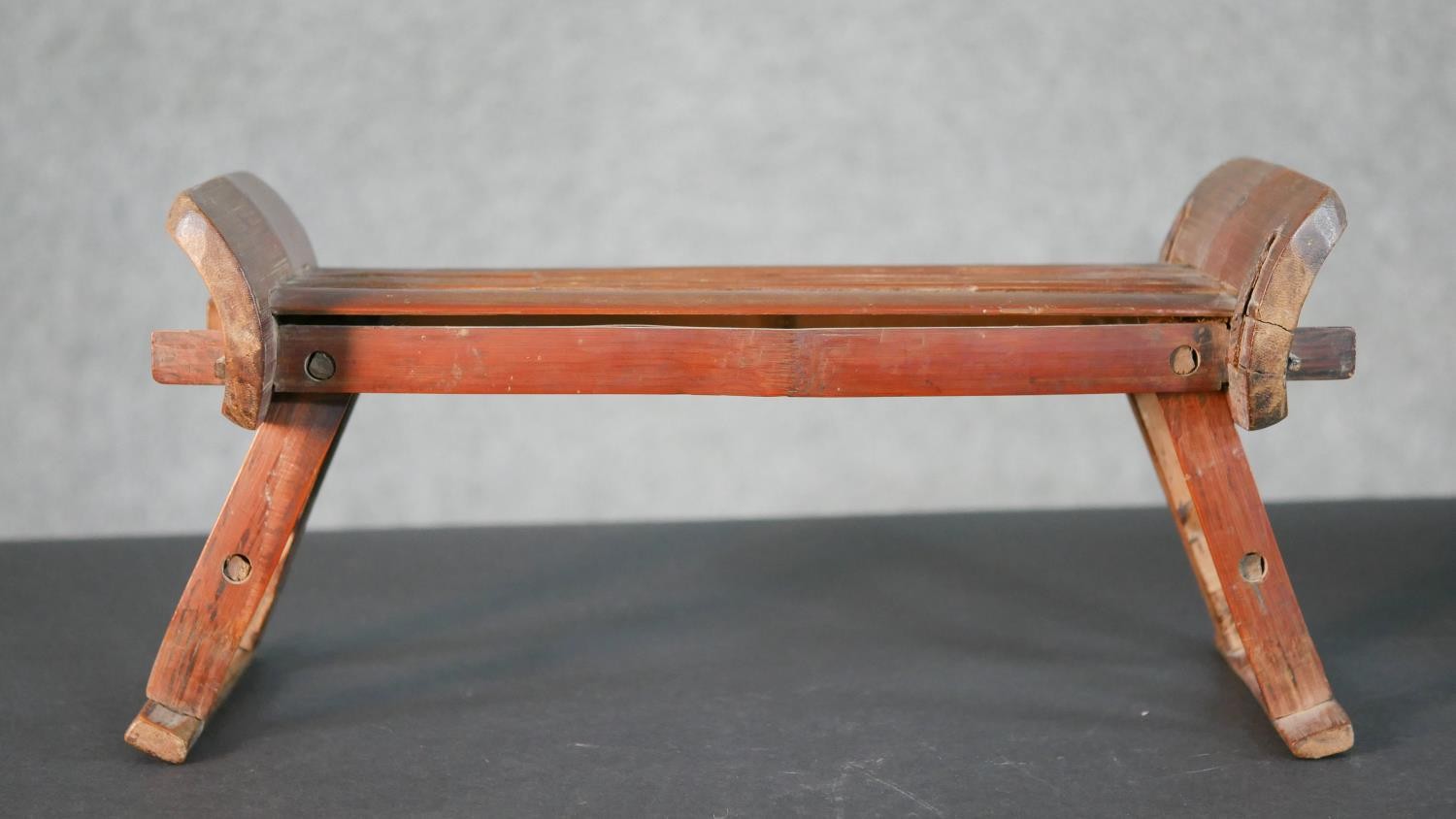 A 19th century Chinese bamboo folding travel head rest along with a carved plate inlaid with a - Image 2 of 10