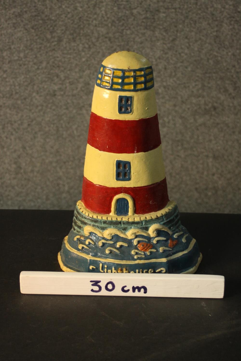 A painted cast iron door stop in the form of a lighthouse. H.34 W.23cm. - Image 2 of 4