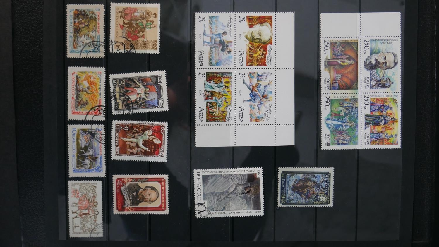 An album of world stamps along with a British Collecta coin album filled with various British coins. - Image 5 of 15