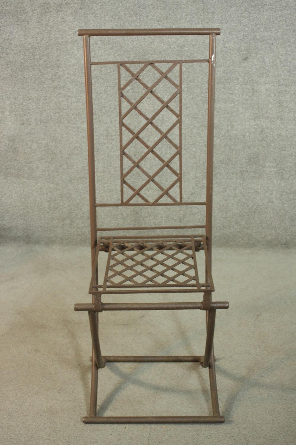 A set of four wrought iron folding garden dining chairs, with lattice back and seat. - Image 4 of 8