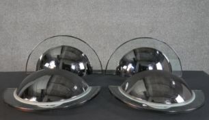 Two pairs of mid century Estiluz chrome and glass semicircular design wall lights, with makers