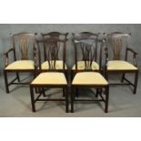 A set of six 18th century style mahogany dining chairs including two carvers and four side chairs,