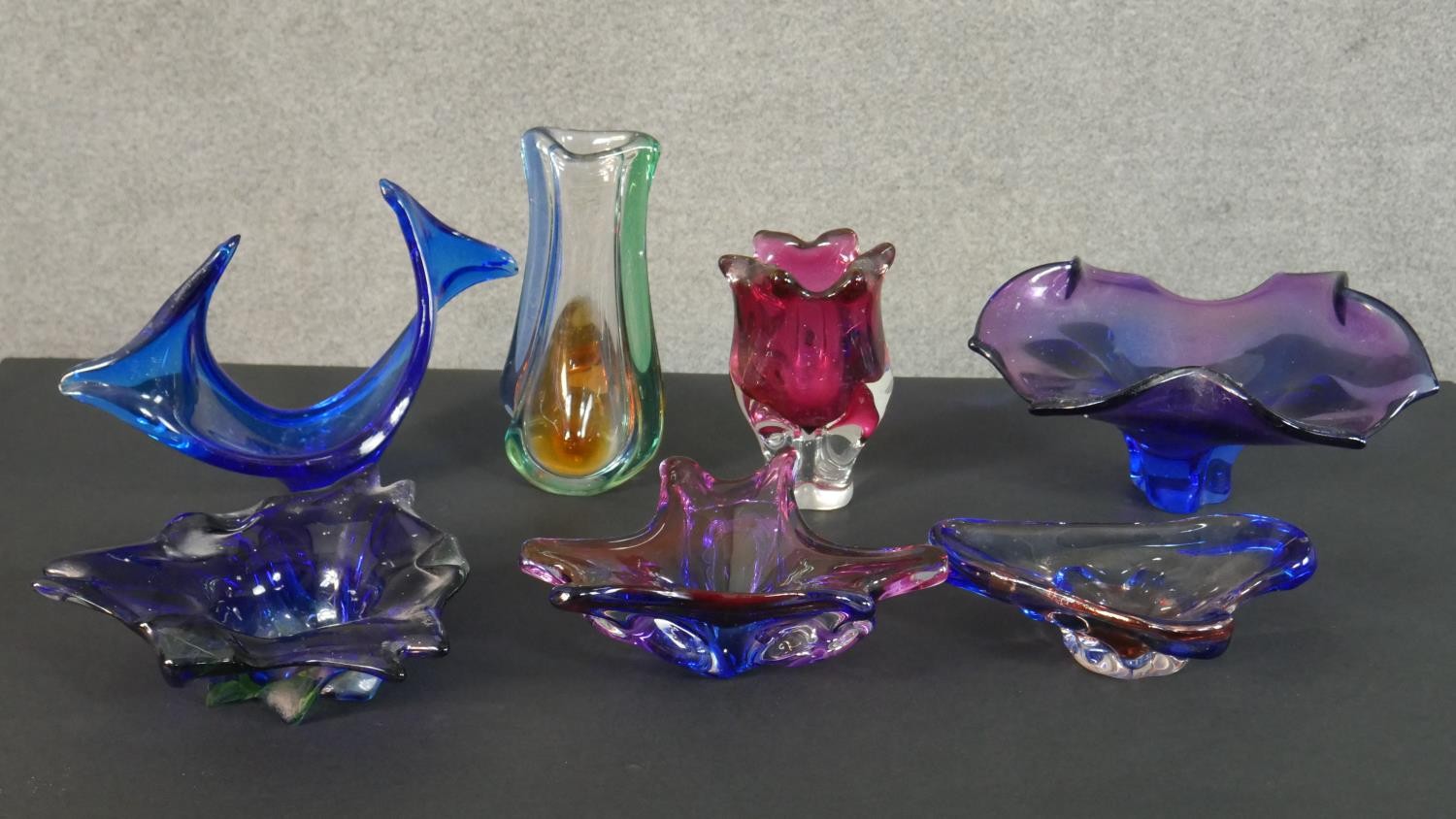 Seven 1960's Sommerso coloured abstract 'exploding glass' design bowls and vases. Each with a