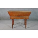 A 19th century elm dough proving bin with lift off panel top on turned tapering supports. H.77 W.