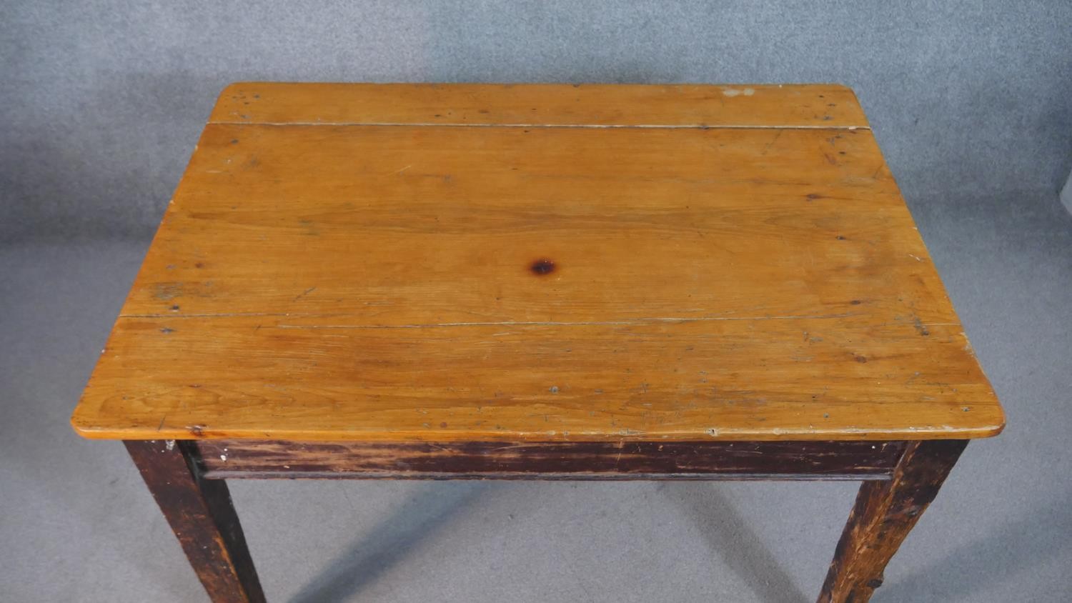 A C.1900 planked top kitchen table on distressed square section tapering supports. H.74 W.119 D.82cm - Image 5 of 8