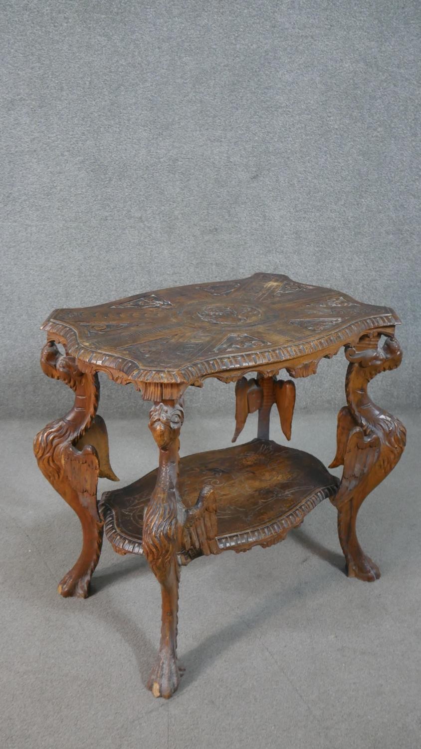 A late 19th century oak occasional table with shaped and carved central medallion raised on - Image 8 of 14