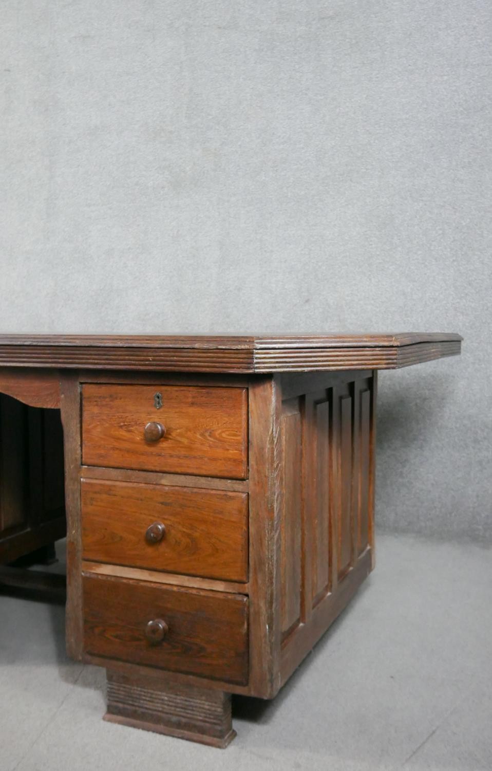 A vintage pedestal desk, the rectangular top with canted corners and a reeded edge, both pedestals - Image 6 of 7