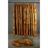 Three fully lined silk mix tribal design curtains with elephant motifs. H.160 W.380cm.