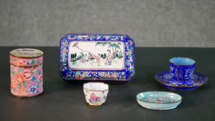 A collection of six Peking enamel pieces, including a miniature cup and saucer, a lidded box with