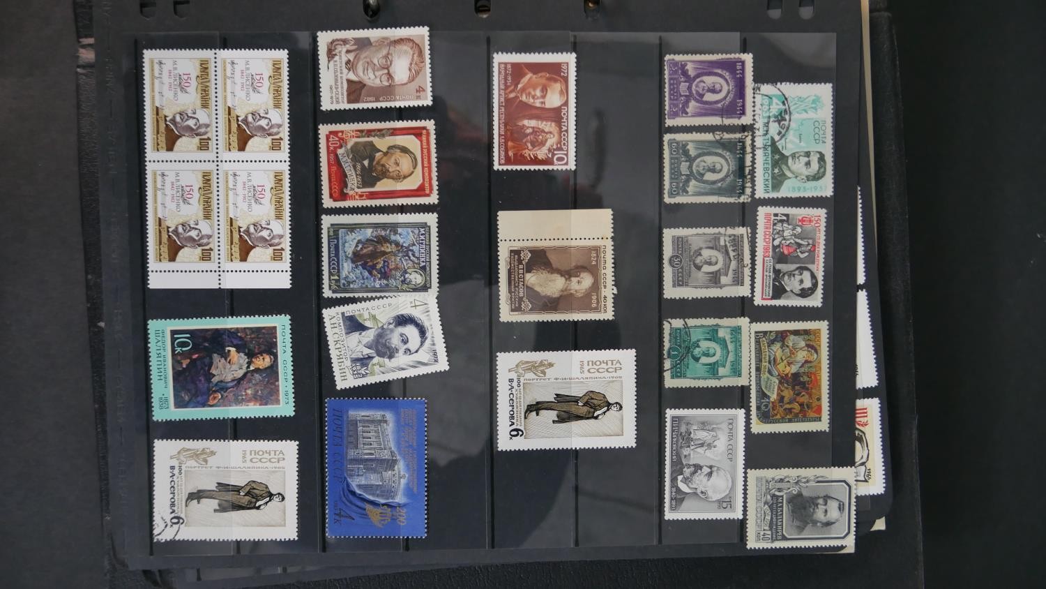 An album of world stamps along with a British Collecta coin album filled with various British coins. - Image 6 of 15