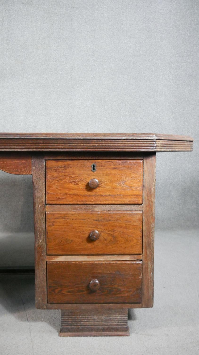 A vintage pedestal desk, the rectangular top with canted corners and a reeded edge, both pedestals - Image 2 of 7