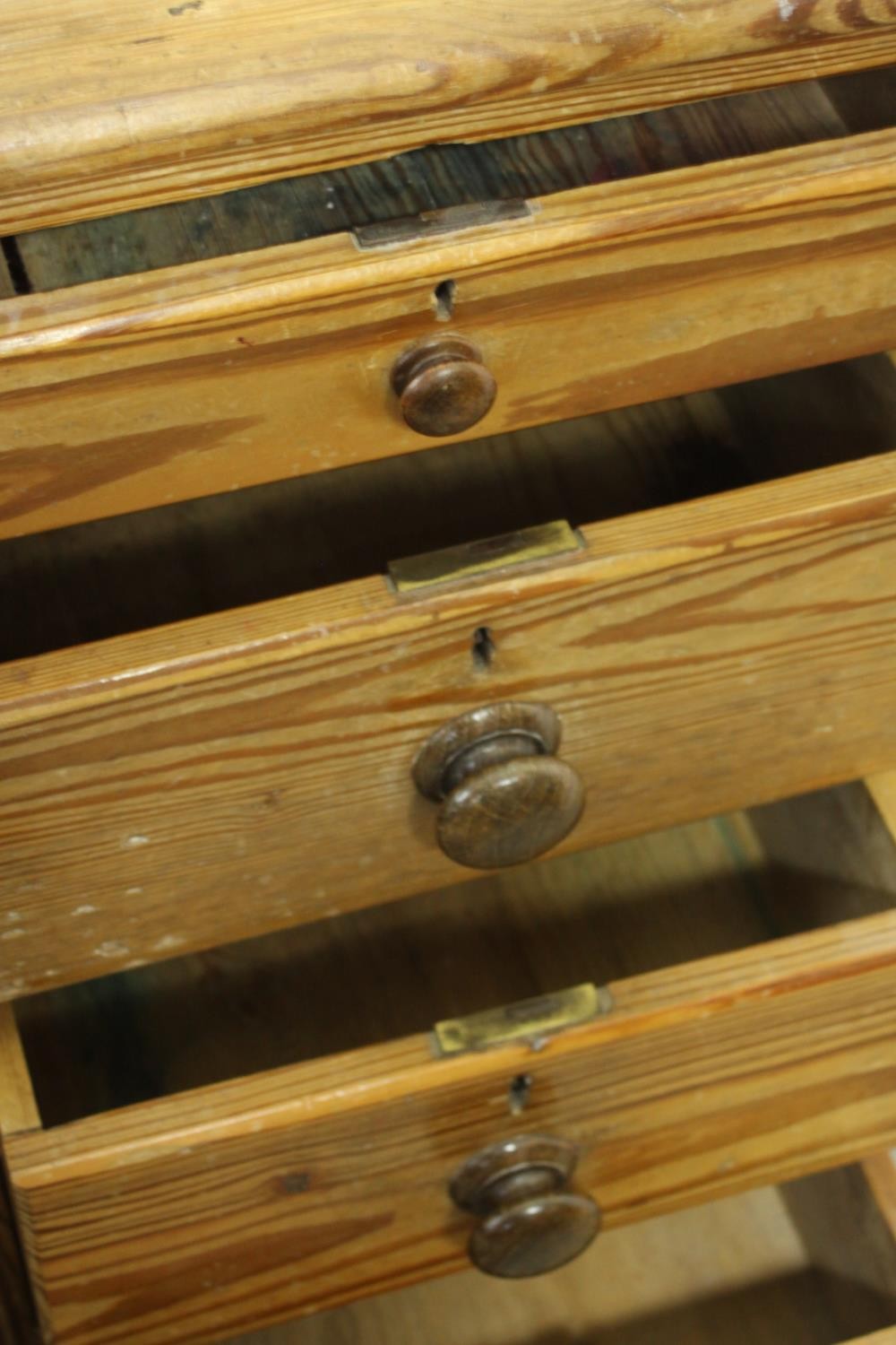 A Victorian pitch pine kneehole desk, with three short drawers, over a cupboard door to one - Image 7 of 8