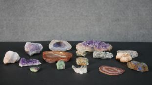 A collection of gemstones and minerals, including amethyst, agate, rock crystal and corrundum. L.