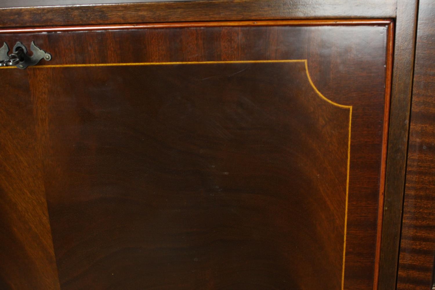 A George III style reproduction mahogany side cabinet, with a dentil cornice over a rounded arched - Image 7 of 7