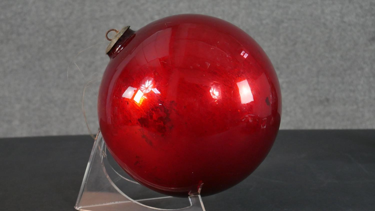 A Moroccan style coloured glass and brass lantern, a large red foil blown glass bauble and a gilt - Image 2 of 11