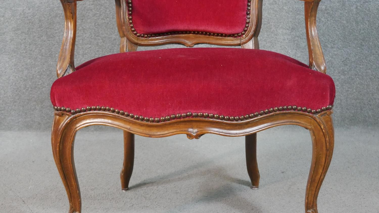 A pair of French walnut Louis XV style fauteuil armchairs, upholstered in red fabric to the back, - Image 3 of 7