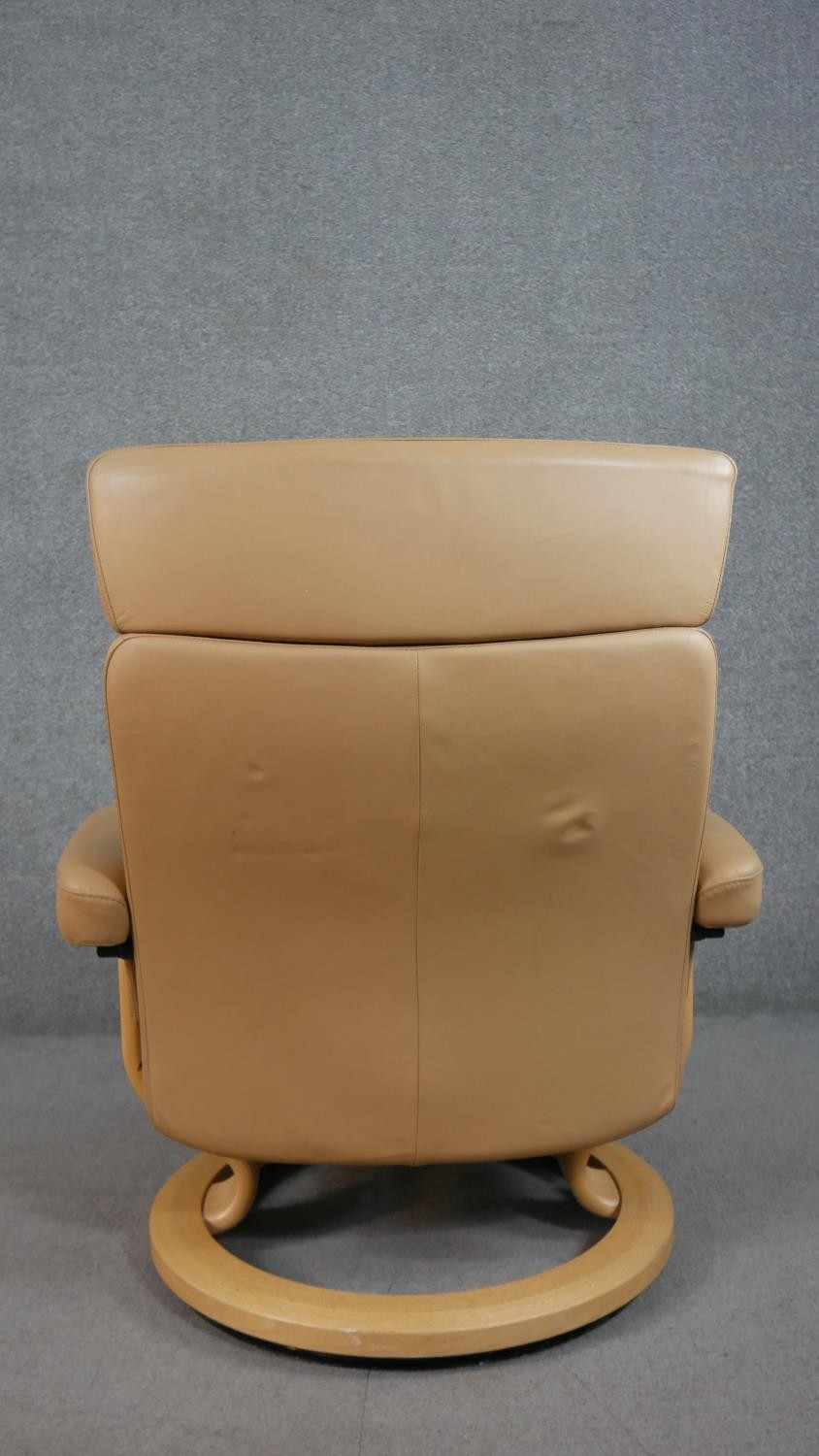 A Norwegian Ekornes Stressless chair & stool, upholstered in tan leather, with a beech frame, on - Image 7 of 11